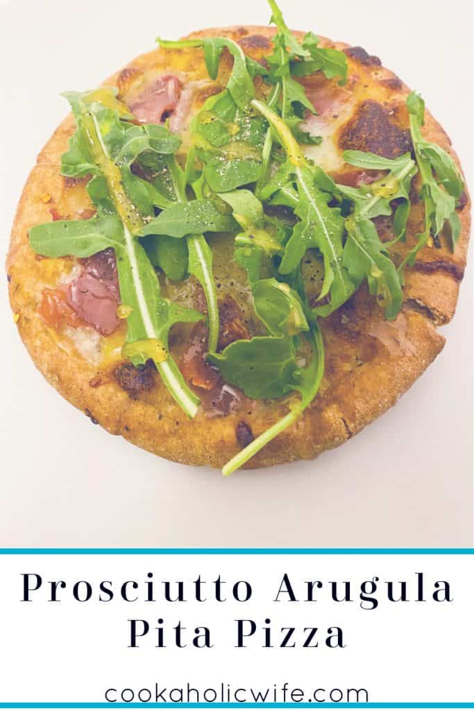 Prosciutto and Arugula are the toppings for this personal sized pizza made on a pita bread