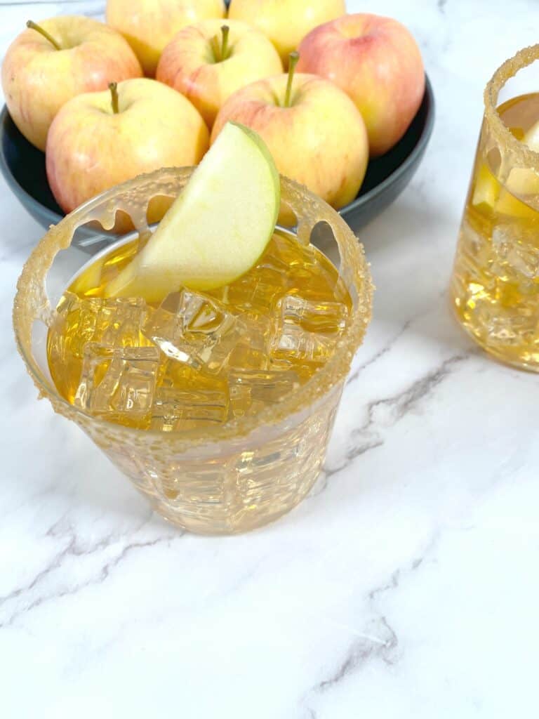 caramel apple whiskey sour cocktail in glass