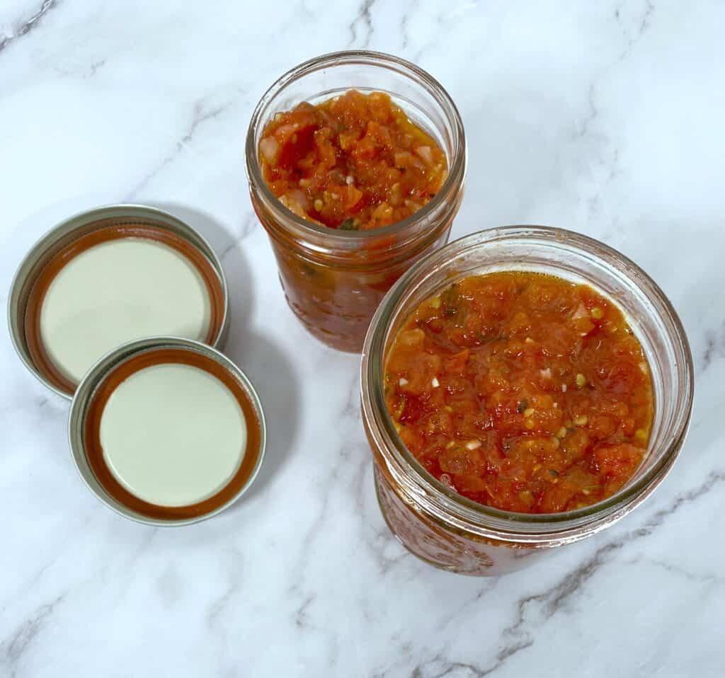 homemade canned tomato sauce in mason jar
