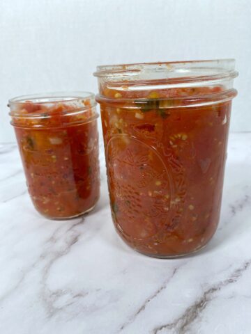 homemade canned tomato sauce in mason jar