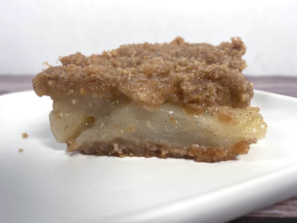 pear brown betty slice on white plate