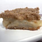 pear brown betty slice on white plate