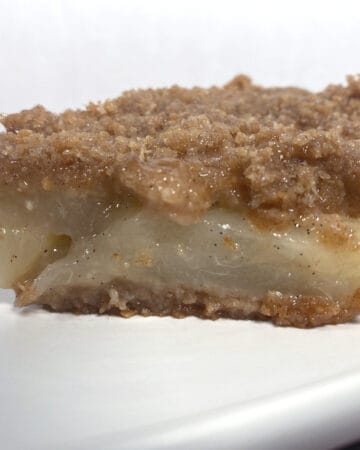 pear brown betty slice on white plate