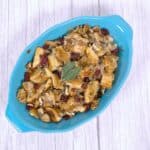 Cranberry pecan stuffing in a teal dish