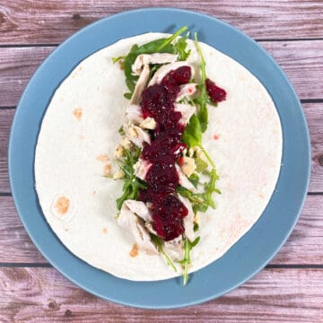 Thanksgiving Turkey Cranberry Wrap – leftover turkey and cranberry sauce are added to a wrap along with blue cheese and arugula