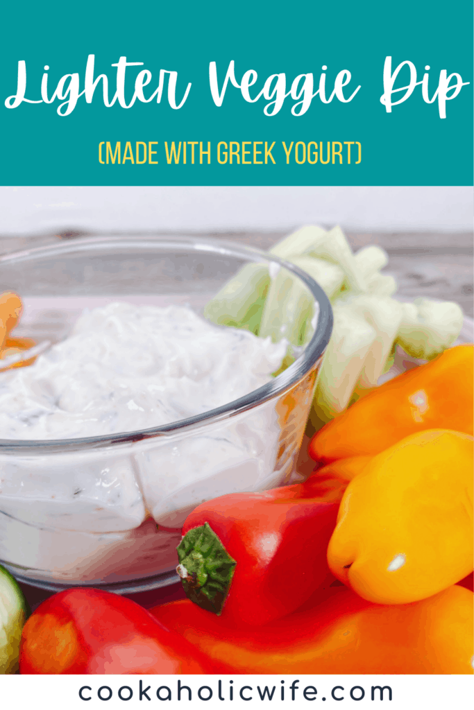 bowl of lighter veggie dip sits on a platter surrounded by fresh vegetables