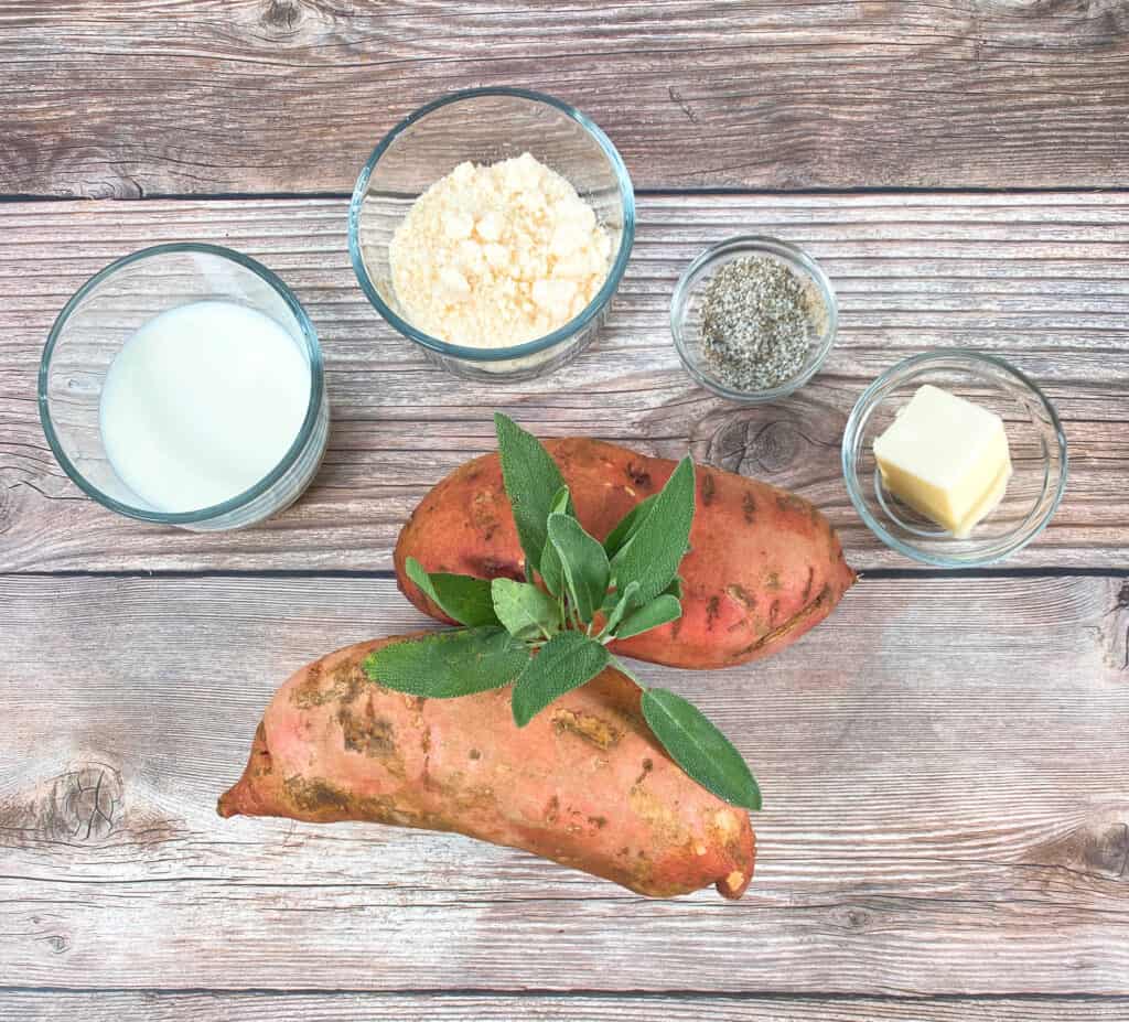 ingredients for parmesan sage mashed sweet potatoes - sweet potatoes, fresh sage, parmesan cheese, milk, butter, salt and pepper