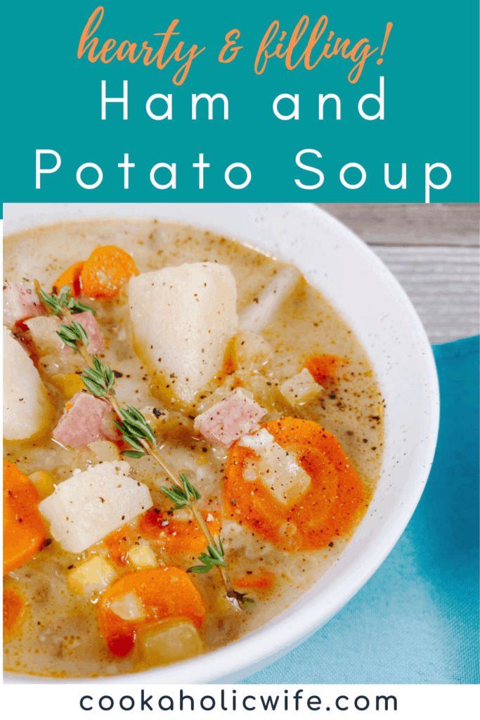 A white bowl of creamy ham and potato soup covers nearly all of the image. In the bottom corner is a turquoise napkin. The bowl of soup is full of pieces of potato, ham, carrot and corn. Salt and pepper season the dish, with a sprig of fresh thyme on top. 