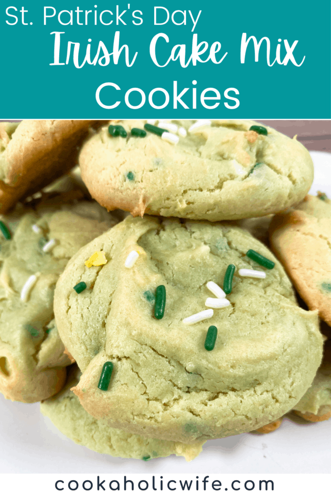 plate of Irish Cake Mix Cookies stacked on top of each other with green and white sprinkles