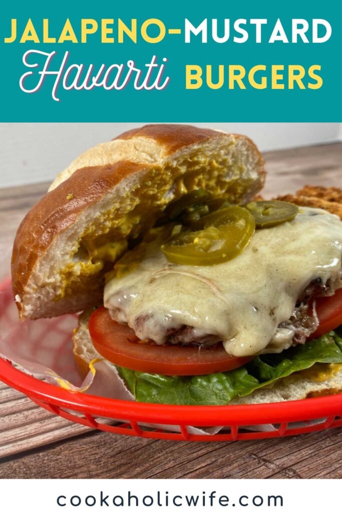 Image for Pinterest. Overlay text states recipe name and website at bottom. Image is side shot of the burger in a red bakset.