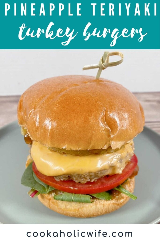 Image for Pinterest - top of image has text overlay with recipe title. Prepared burger sits on a light green plate