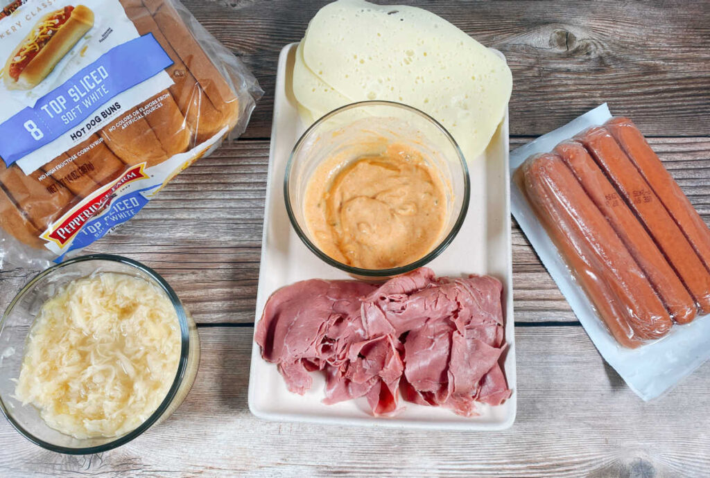 ingredients for the recipe sit on a wooden background 