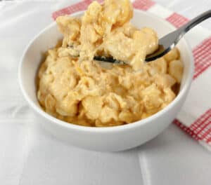 large white bowl full of macaroni and cheese
