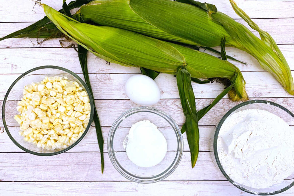 ingredients for this recipe, sans milk, sit on a white wooden background 