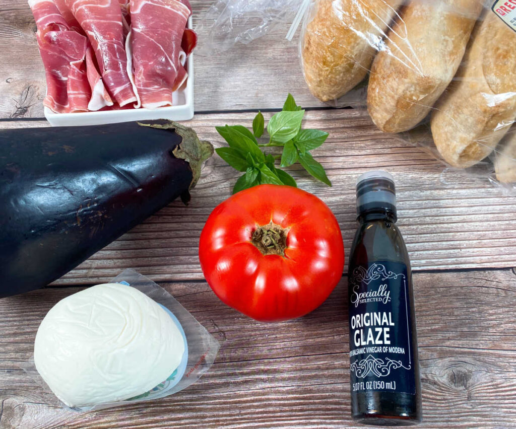 ingredients for the panini sit on a wooden background                       