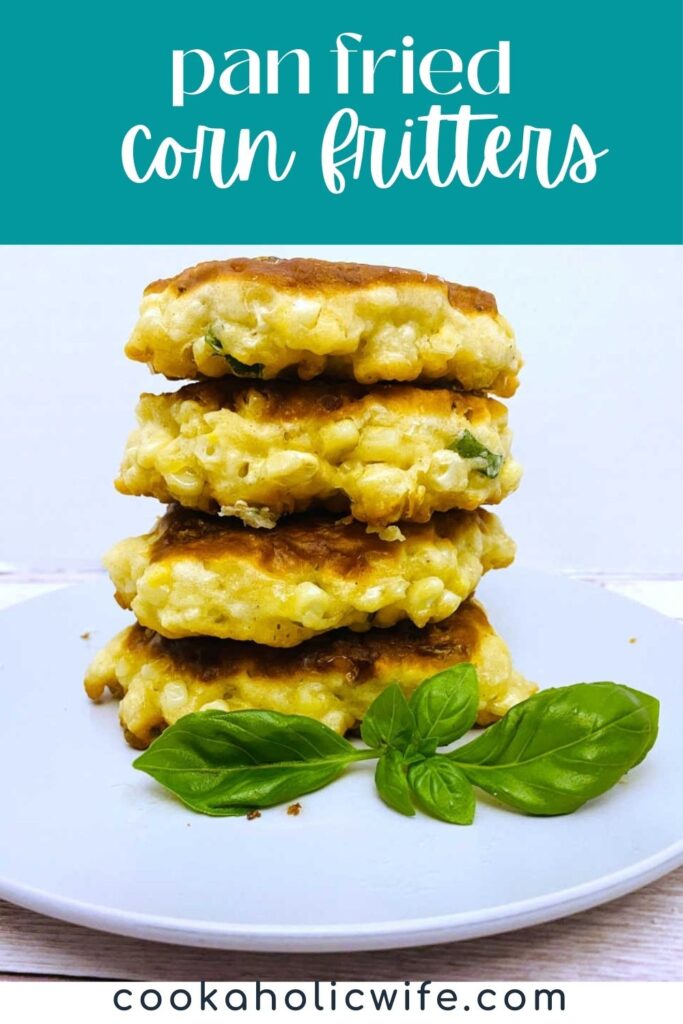 image for pinterest with text overlay of recipe title at top. A stack of corn fritters sits on a white plate garnished with basil.