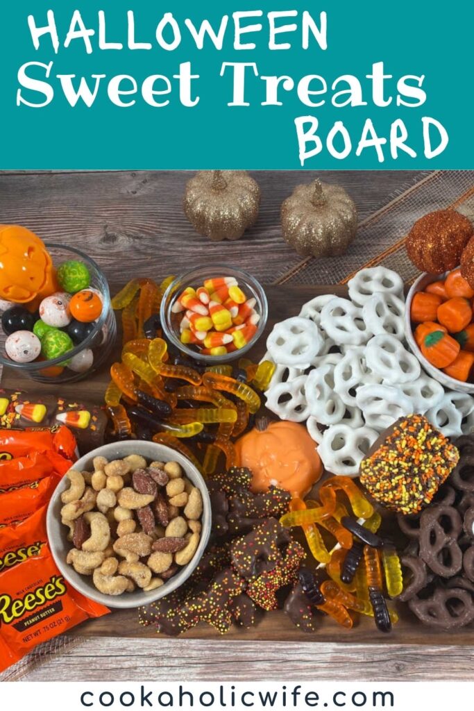 image for pinterest with text overlay of recipe title. Chocolate covered pretzels, candy corn, gummy worms and other halloween candy sit on a wooden board.