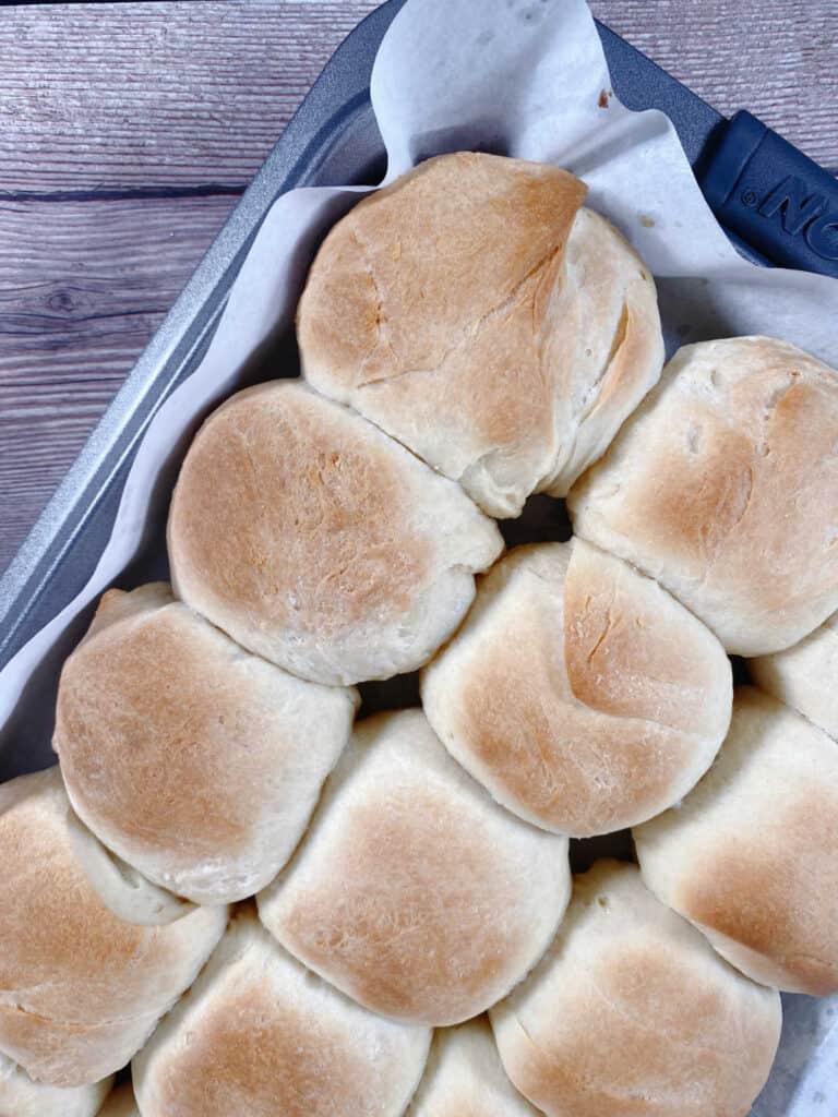 baked rolls sit in a 9x13 baking dish.