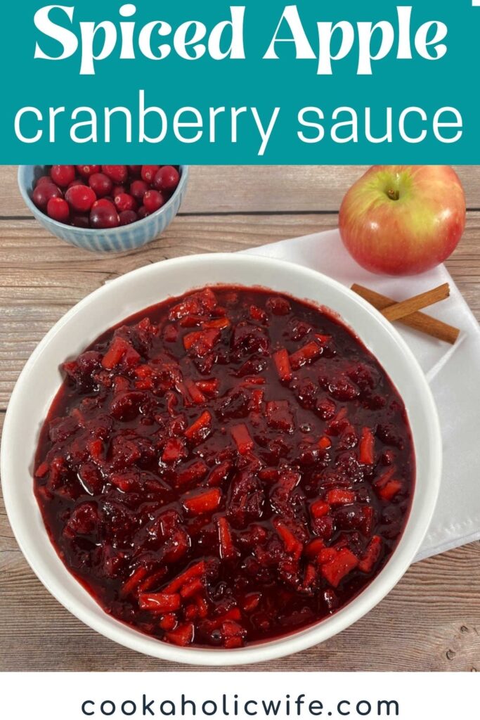 image for pinterest with text overlay of recipe title at top. cranberry sauce sits on  a wooden background. 