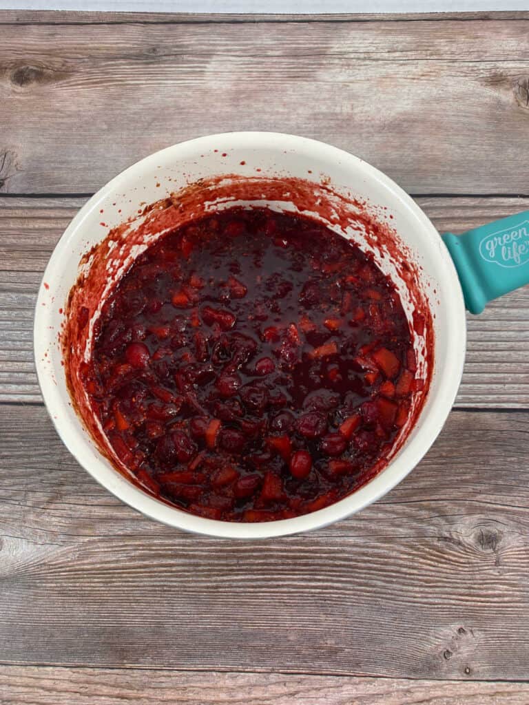 process photo - cooked cranberry sauce is thickening up. 