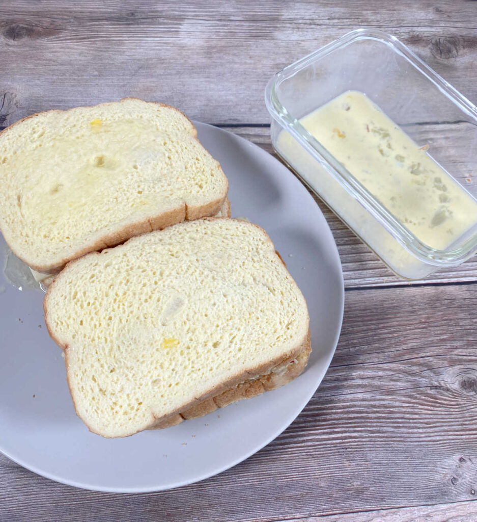 Process shot - Sandwiches dipped in egg and milk batter waiting to be pan fried. 