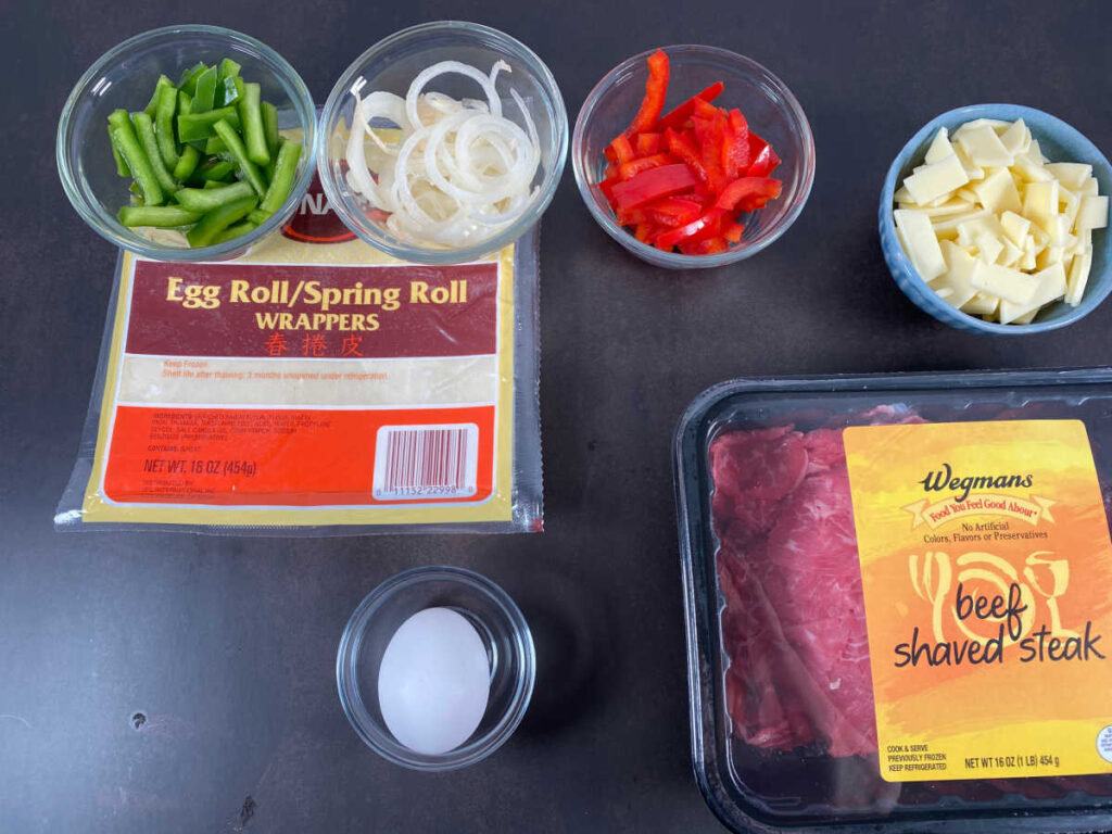 Ingredients for the recipe sit on a black background. 