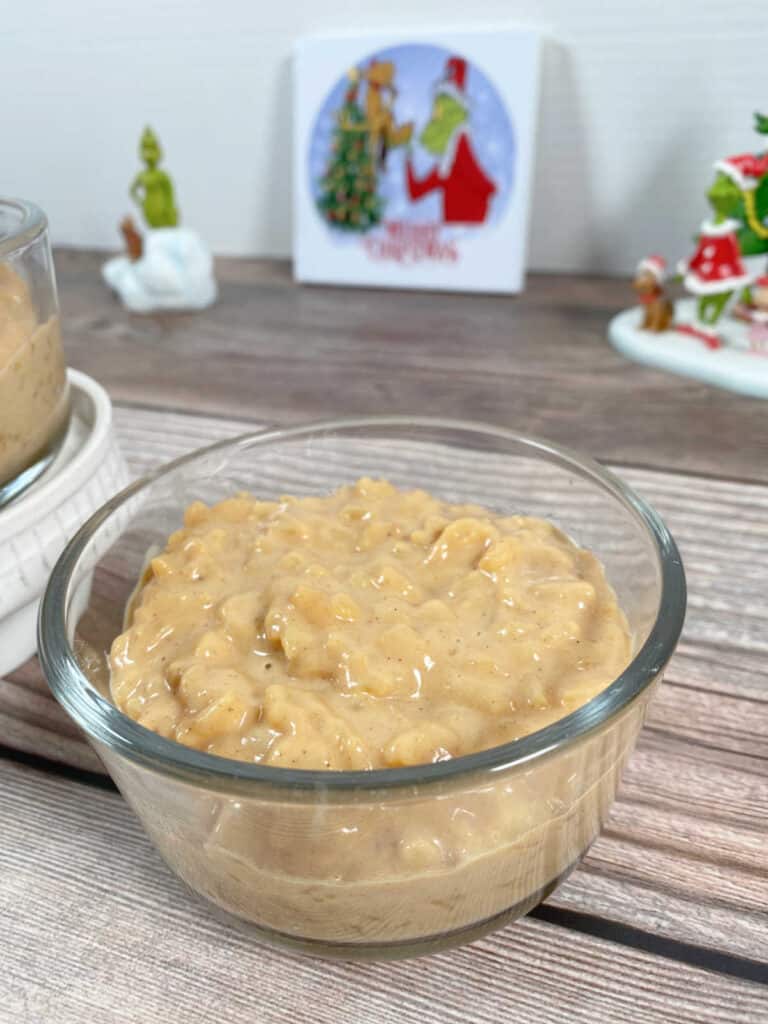 Prepared pudding in a glass ramekin, waiting to be garnished with candies.