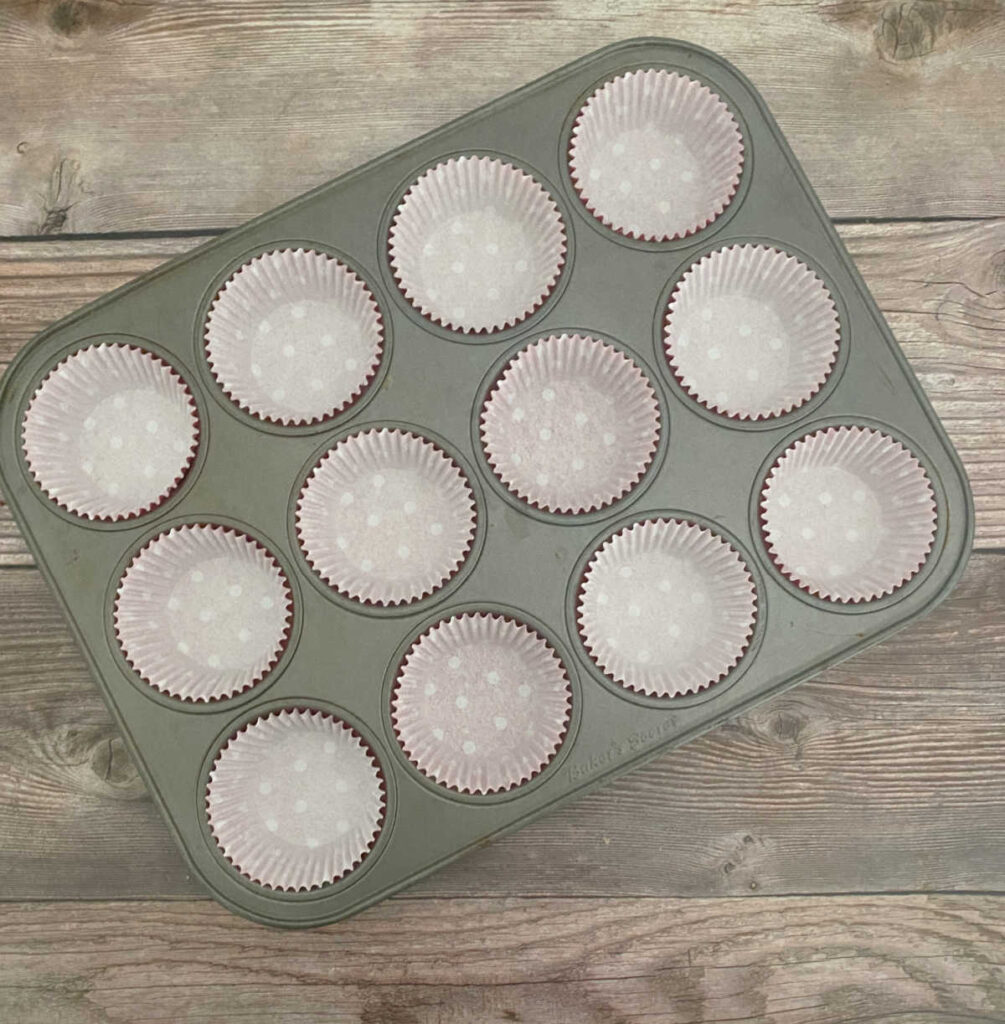 Process shot - cupcake pan with liners 