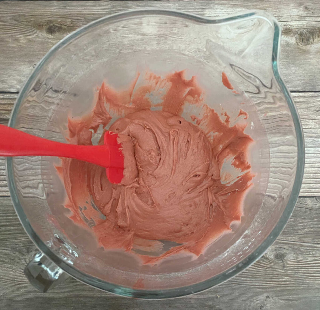 process shot - mixed batter in a glass mixing bowl 