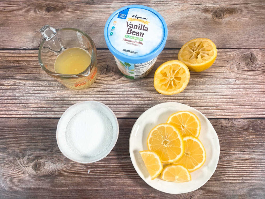 ingredients sit on a wooden background. 