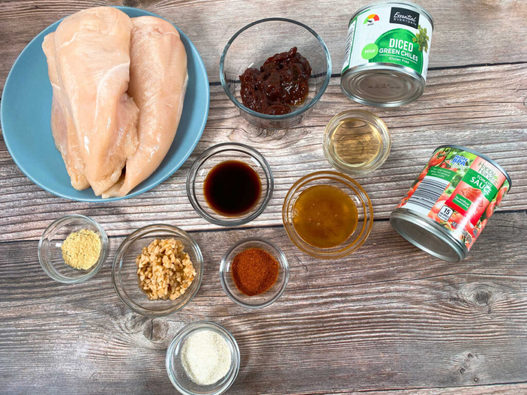 ingredients sit on a wooden background. 