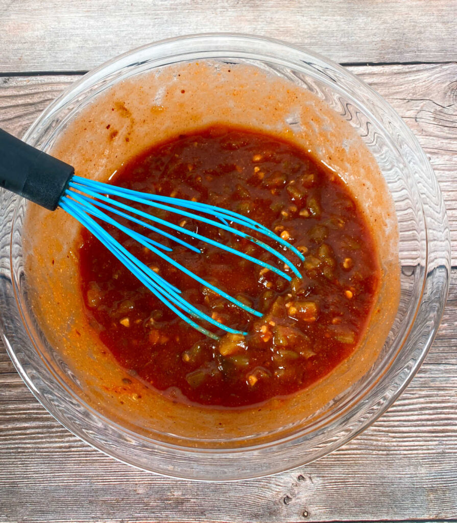 process shot - sauce ingredients whisked together in a glass bowl. 
