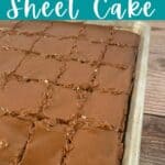 Sheet pan of cake cut into squares.