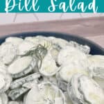 salad in a dark blue bowl on a wooden background,