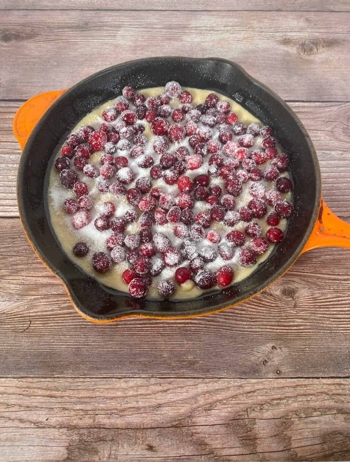 Process shot - cranberries added to batter ready to be cooked. 