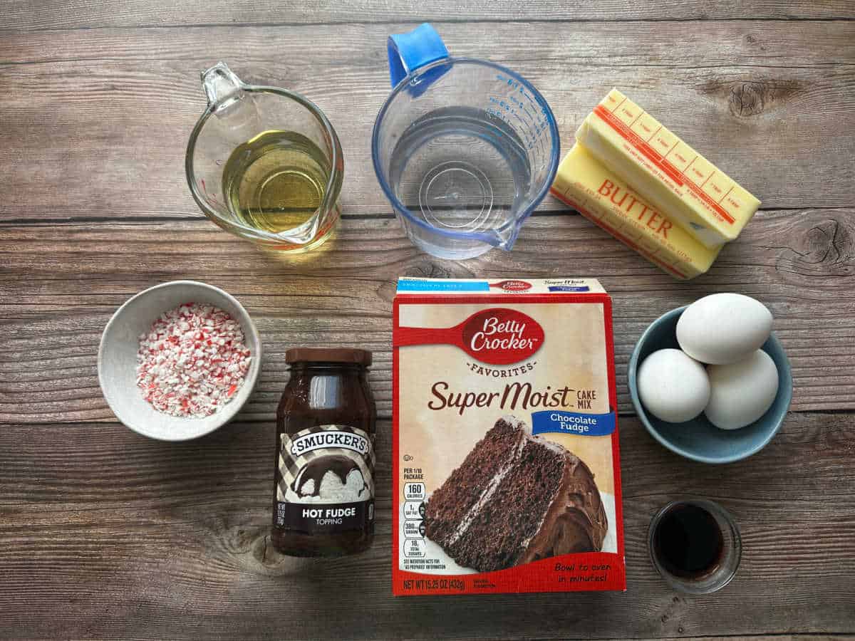 ingredients sit on a wooden background.