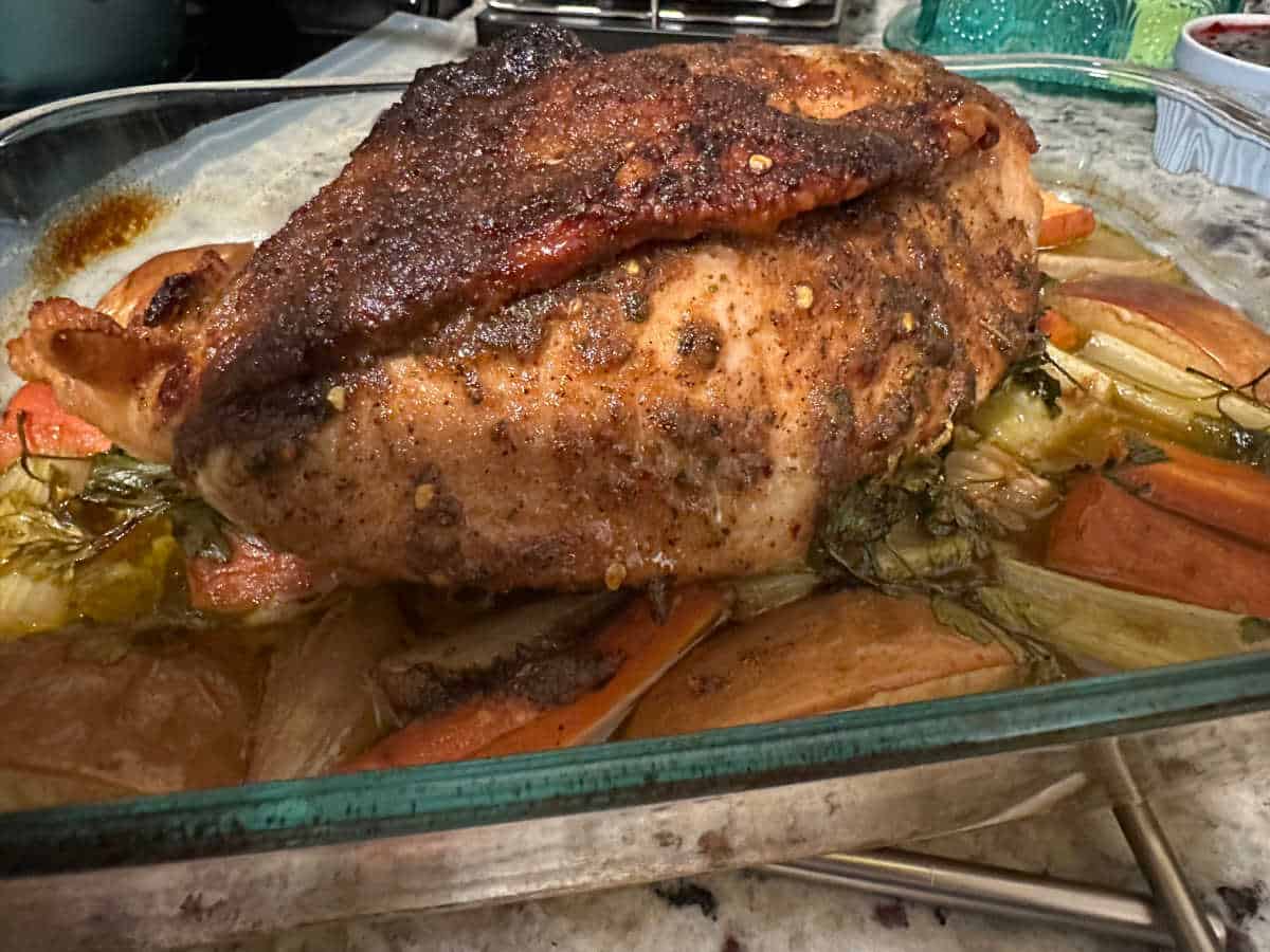 Cooked turkey breast in the baking dish right out of the oven. 