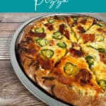 Image for Pinterest with text overlay - pizza on a wooden background,