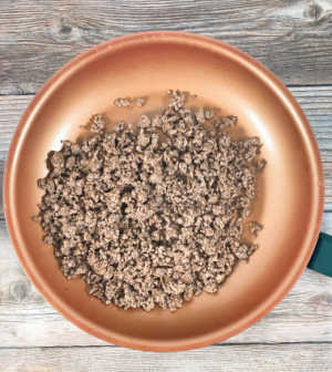 Process shot - browned ground beef in a large skillet. 