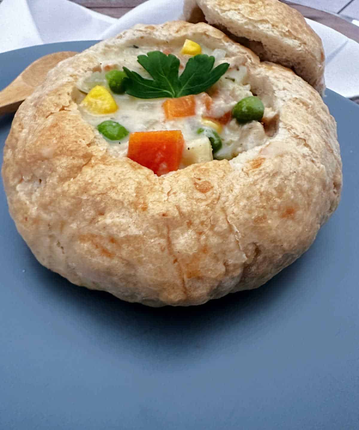 Close up image of soup in a bread bowl. 