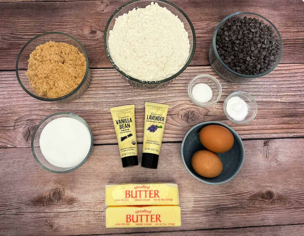 Ingredients for the recipe sit on a wooden background. 