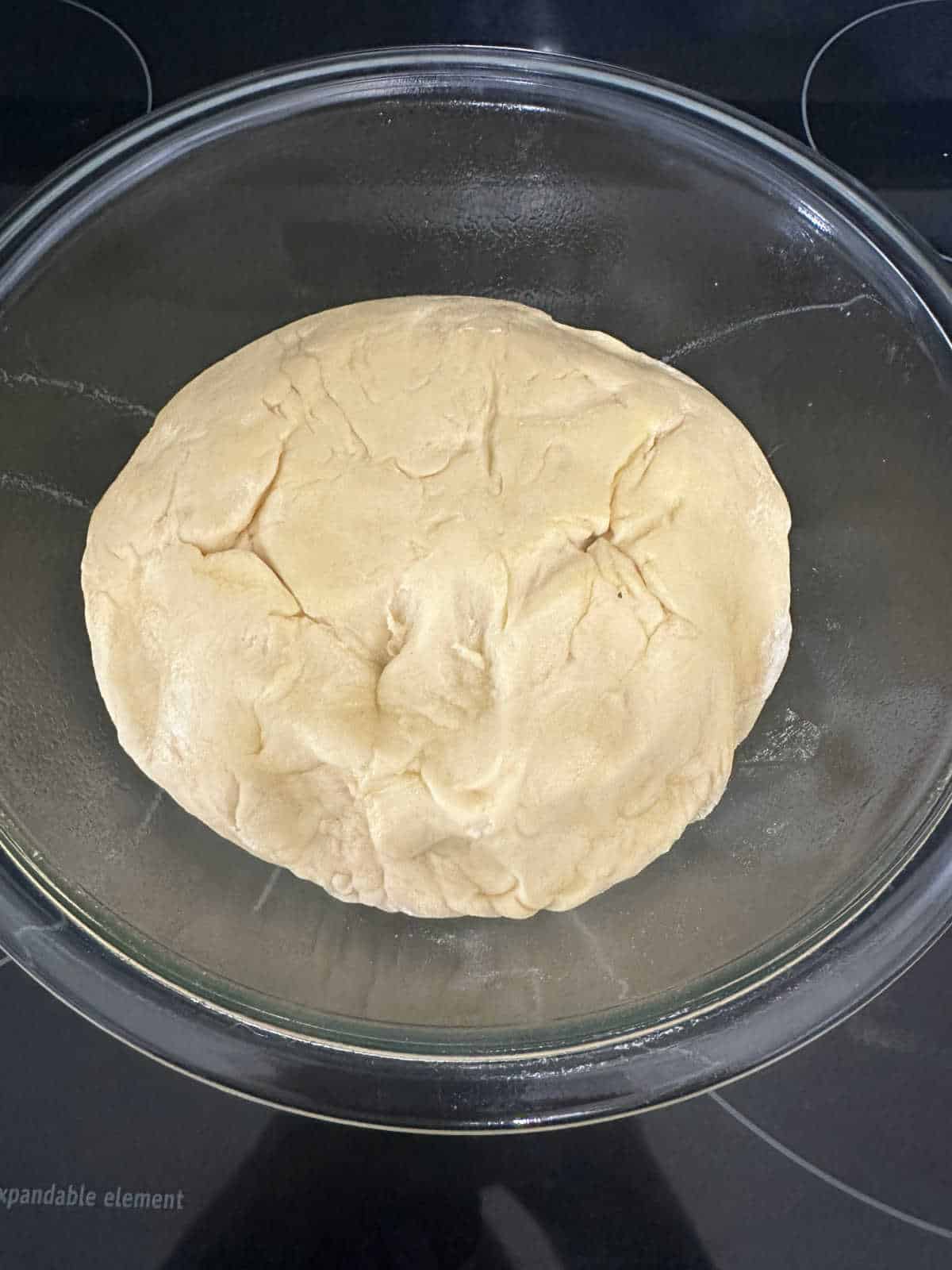 Process shot - dough in bowl, rising.