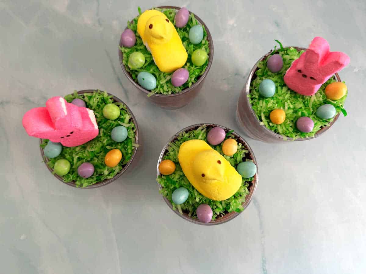 Overhead image of desserts, topped with Peeps chicks and bunnies. 