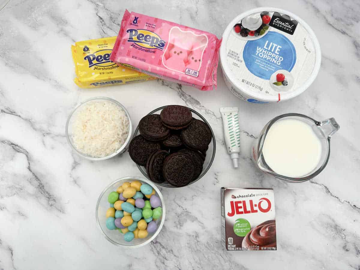 Ingredients for the recipe in glass bowls on a marble background. 