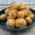 Close up image of plate of pretzel bites stacked high.