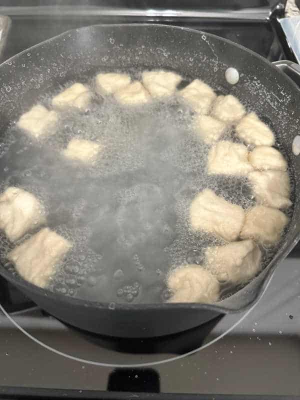 Process shot - pretzel dough in baking soda bath. 