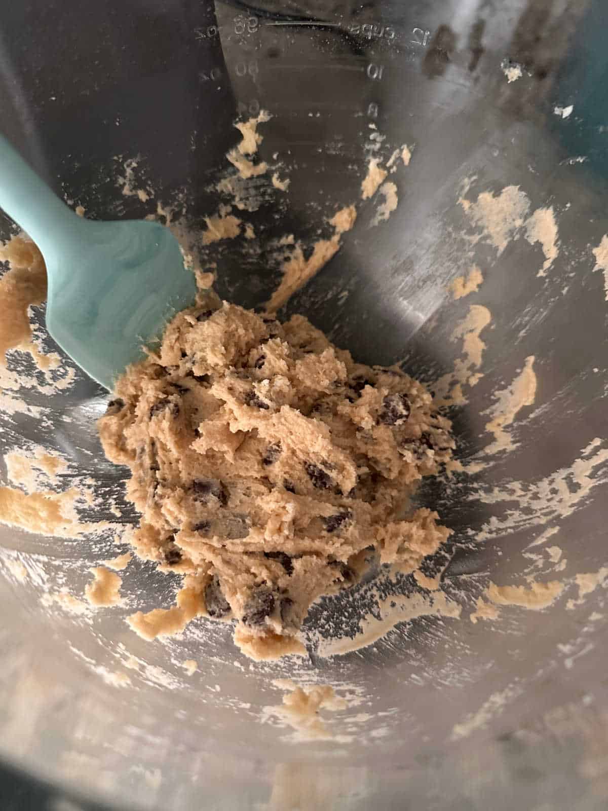 Close up image of cookie dough in a stand mixer, 